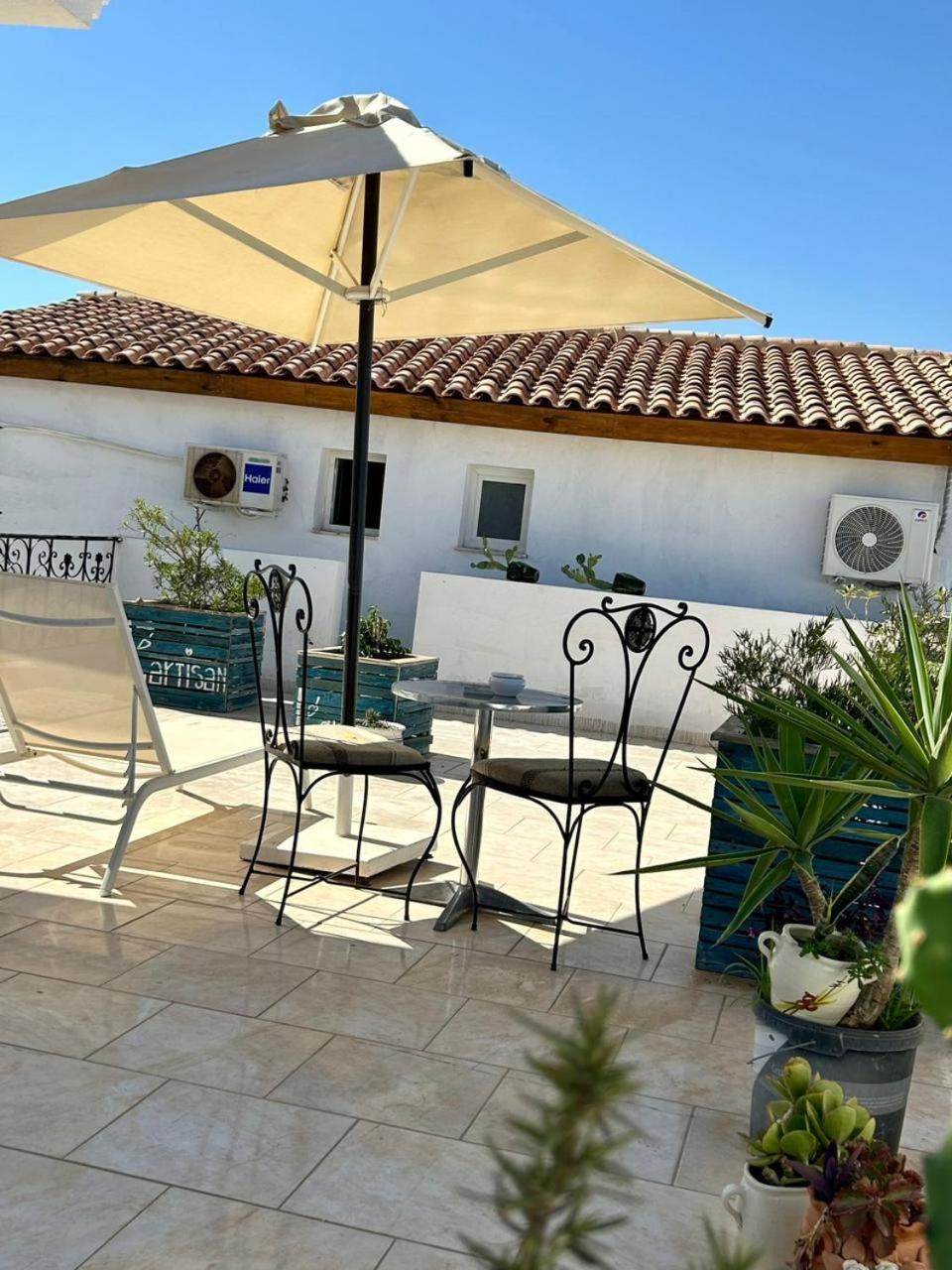 L'Artisan Harqalah Exterior foto